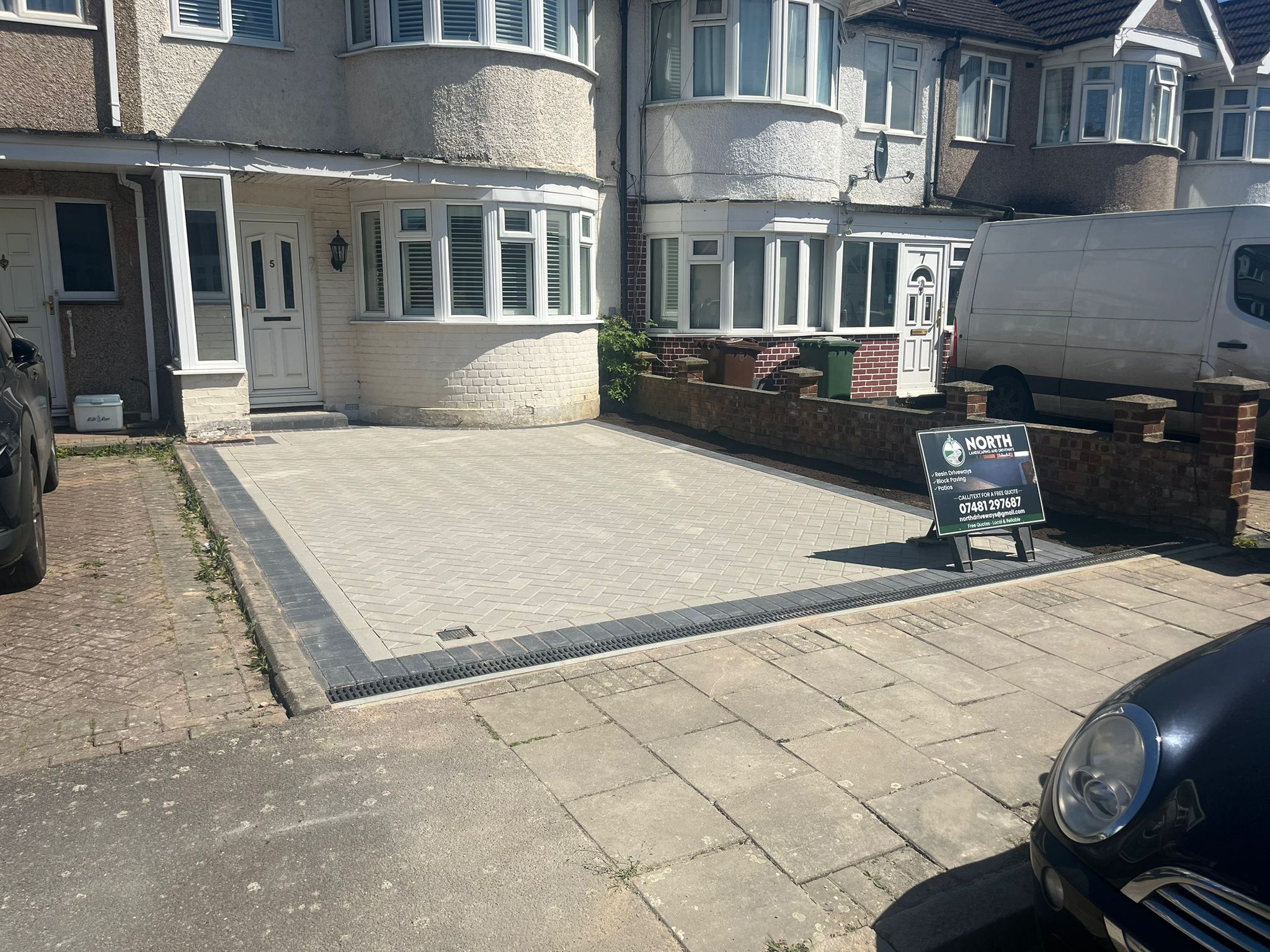 New charcoal and buff block paving driveway with contrast border, Barnet
