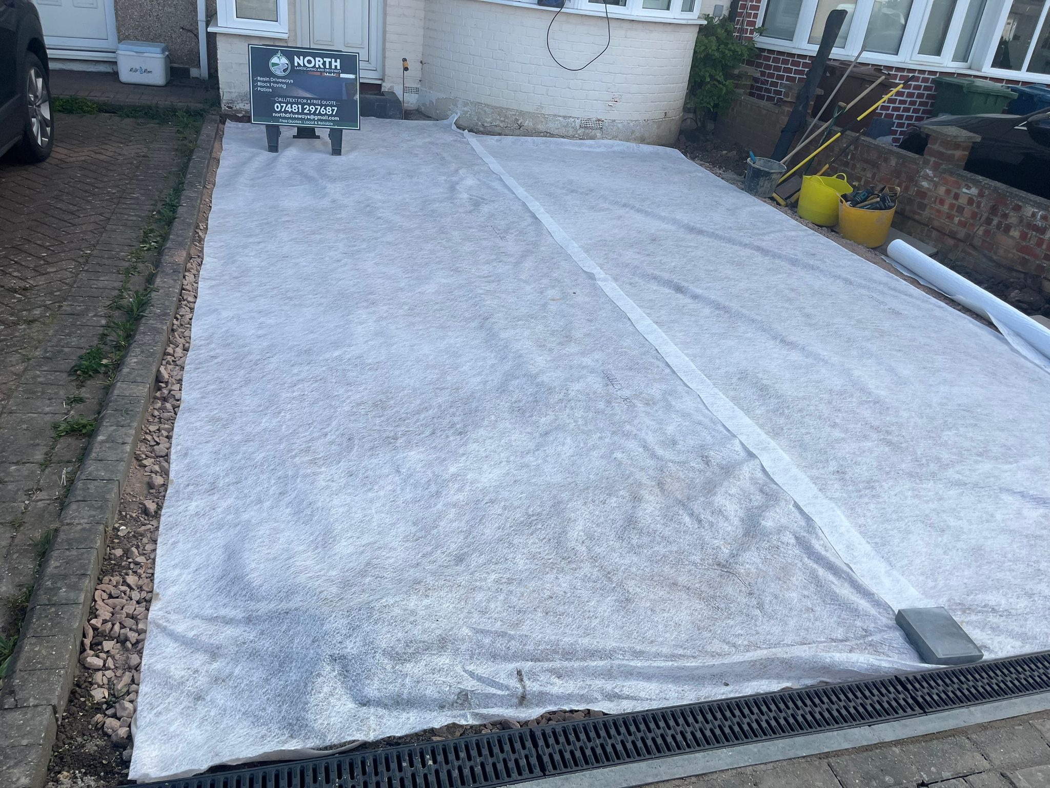 Cracked concrete driveway in Barnet before block paving installation