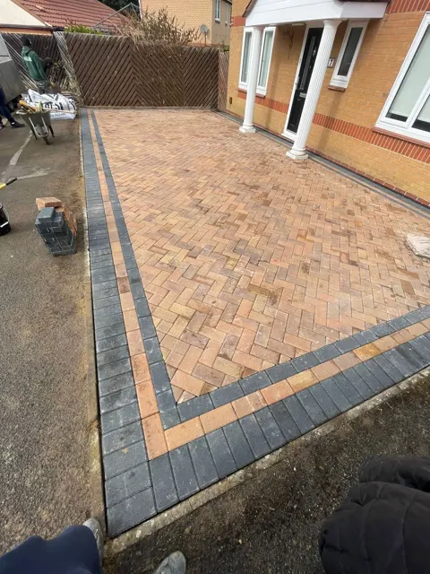 Brindle herringbone driveway with charcoal double border