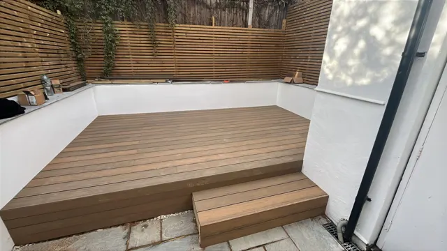 Composite decking steps outside garden doors