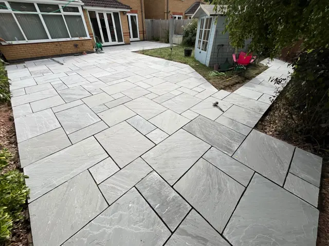 Grey porcelain patio slabs with clean joints